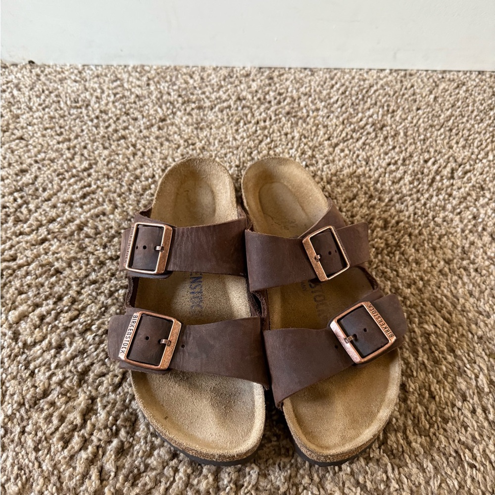 Birkenstock Brown Sandals with Adjustable Straps and Contoured Footbed